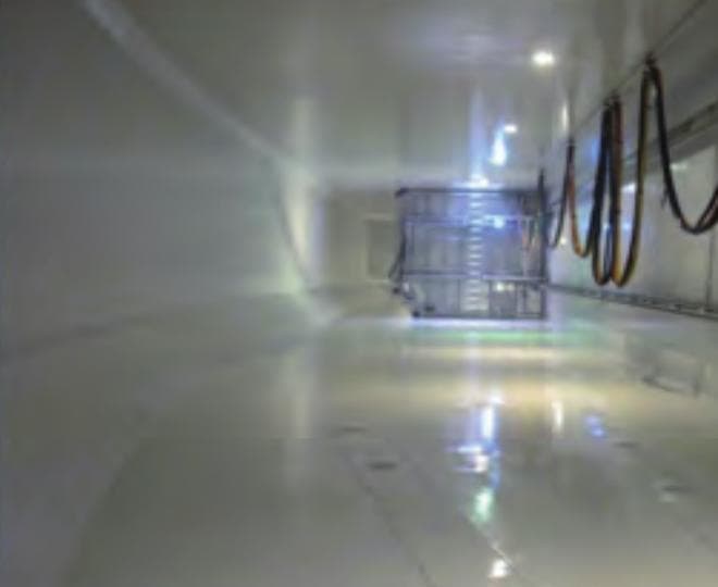 Interior of a coated cargo well on a live-fish carrier